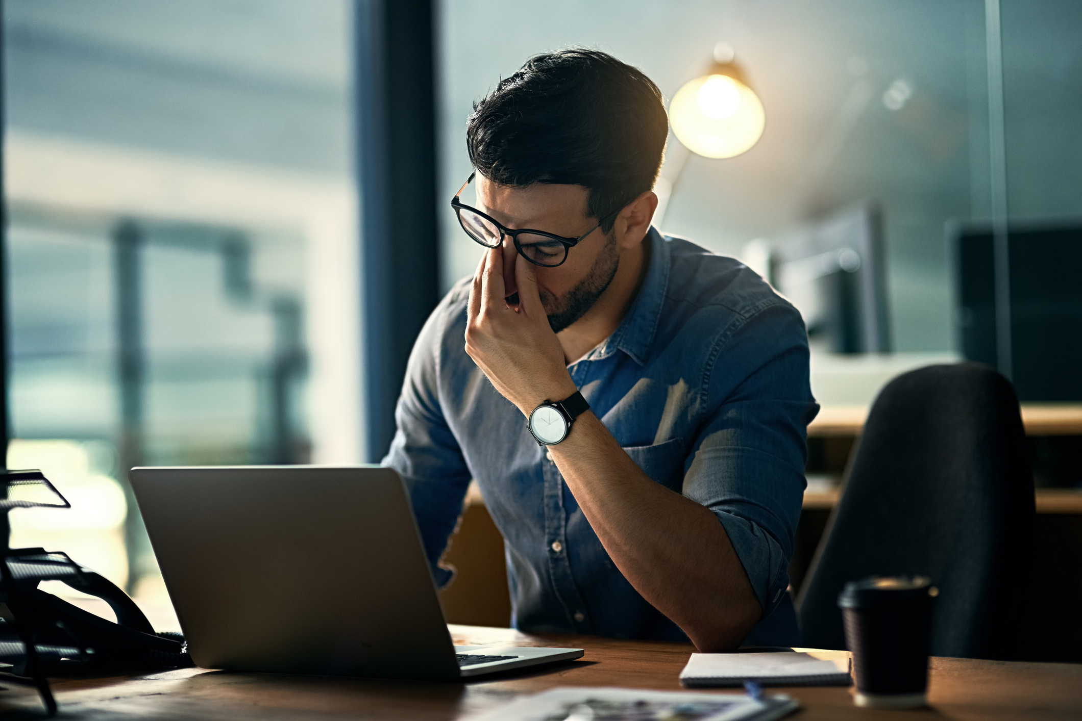Person managing stress while tracking blood pressure